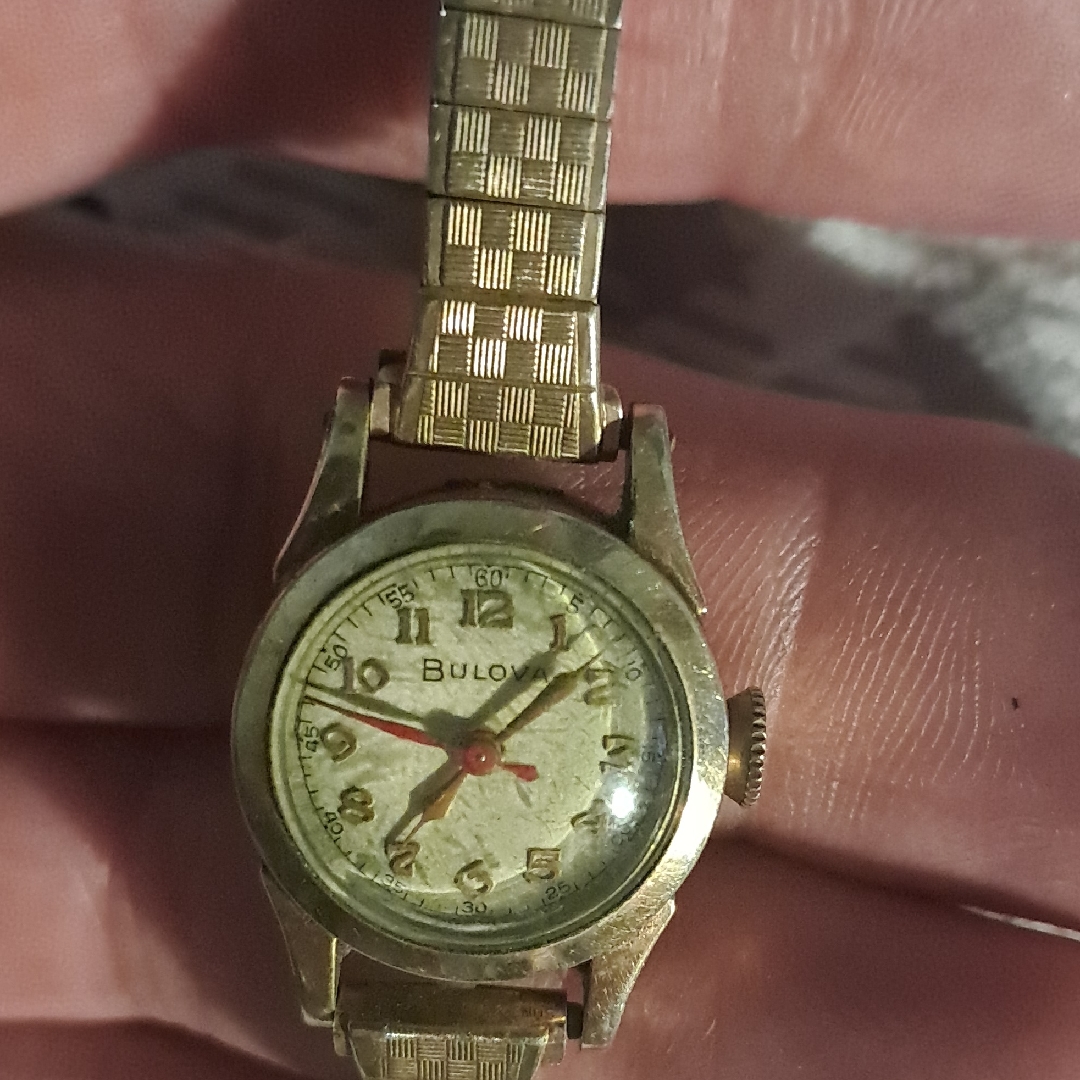 Bulova Gold And Cream Ladies Wristwatch With Red Seconds Hand 350$